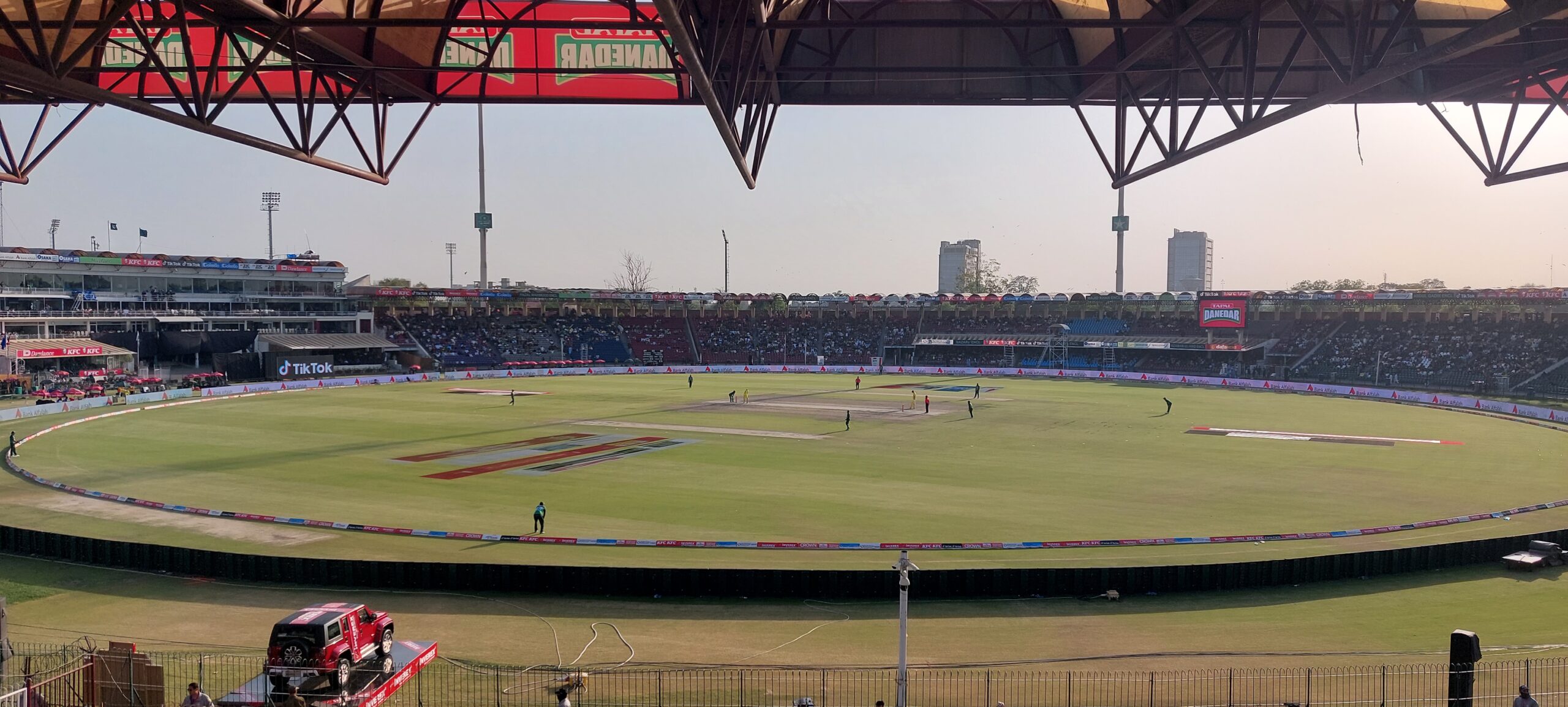 Cricket match in progress at Gaddafi Stadium, Lahore — the venue hosting the PSL 2026 final on May 3.